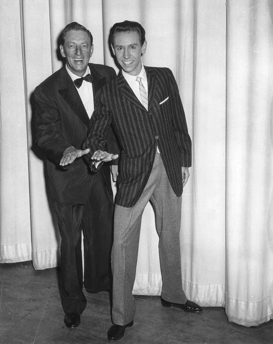 Dean and a friend in dark suits