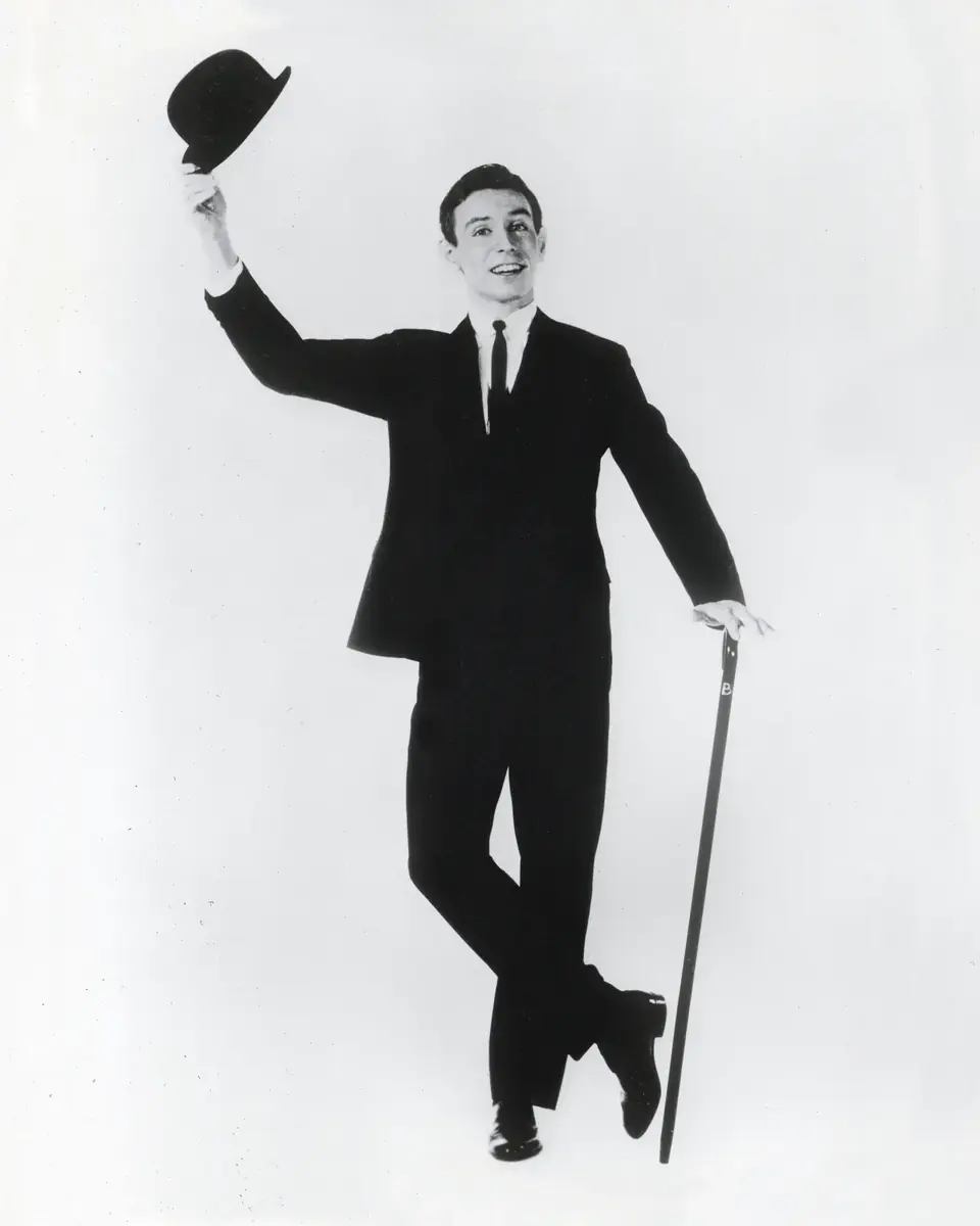 Young Dean with a derby and cane