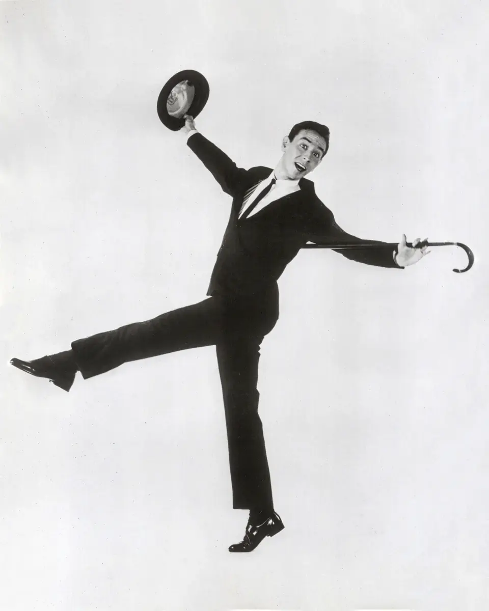 Young Dean mid-kick with his derby raised