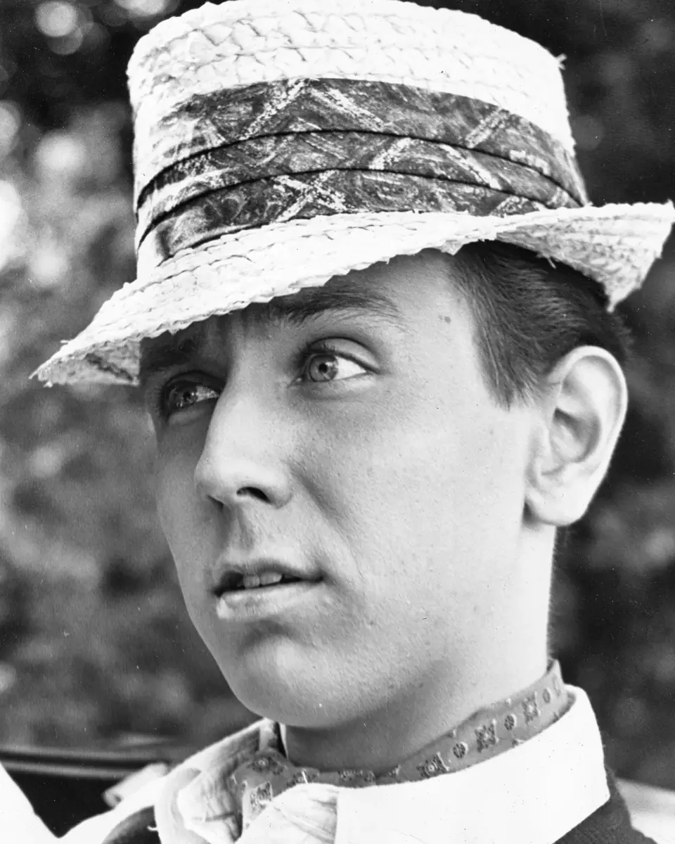 Close-up of young Dean in a boater hat